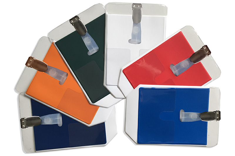 Badge holders and stain-resistant pockets