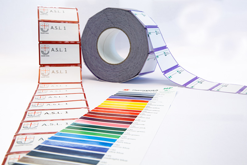 Heat-sealant backings and inks